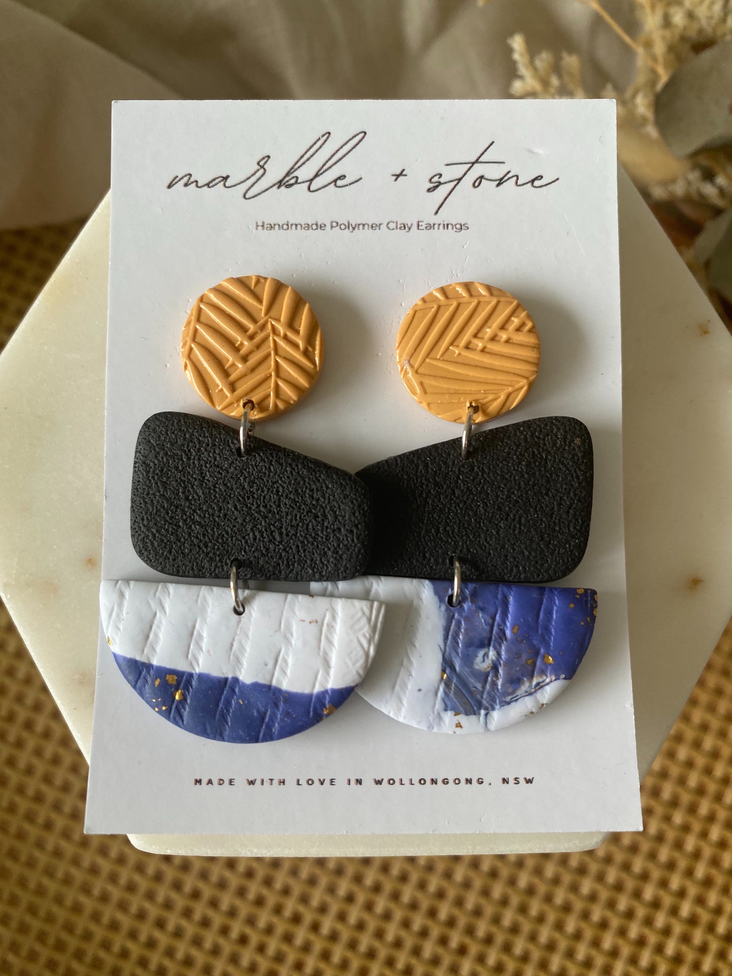Mustard, black, blue and white