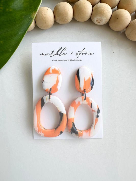 Carla - orange, white and black